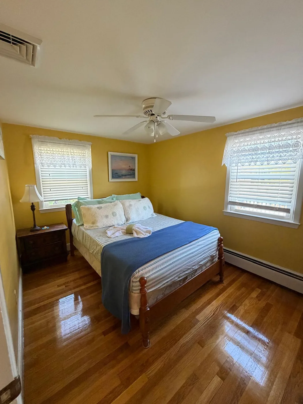Real LC Cleaning work: finished bedroom with polished hardwood floors
